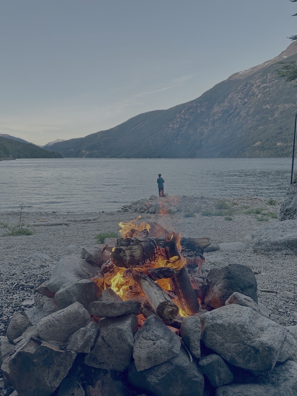 A fire beneath the mountains